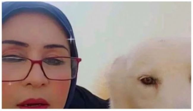 شاهد .. زوجة محافظ حضرموت تنشر صورتها مع (كلب) وتعلق انا مبسوطة وكلبي كمان !!!